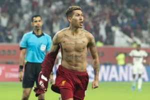 DOHA, CA - 21.12.2019: LIVERPOOL X FLAMENGO - Roberto Firmino do Liverpool comemora após marcar gol (1-0) durante jogo entre Liverpool (da Inglaterra) e Flamengo (do Brasil) válida pelo final do Mundial de Clubes FIFA 2019, realizado no Estádio Khalifa International em Doha, Catar. (Foto: Richard Callis /Fotoarena/Folhapress) ORG XMIT: 1849135