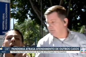 Mulher invade reportagem ao vivo e grita: 'Globo é um lixo, Bolsonaro tem razão'